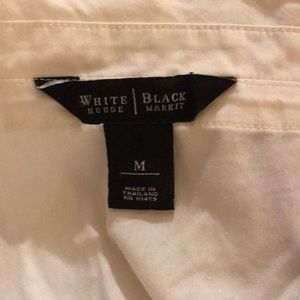 Black and white house ruffle collar blouse